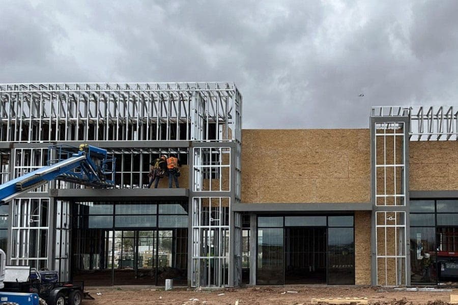 Owner's representative supervising a commercial construction site in San Antonio, Texas